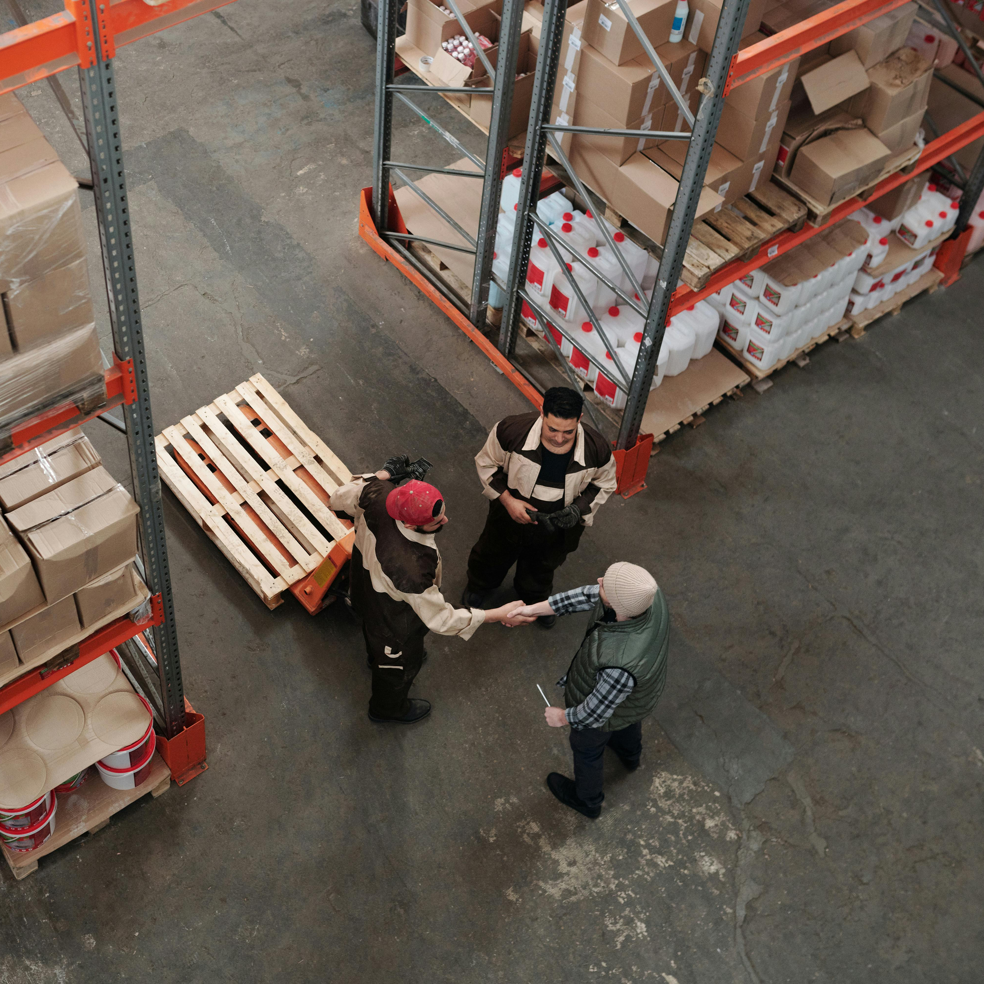 Three men working